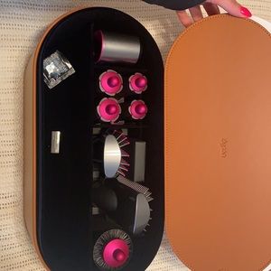 Brand New Dyson leather case + all attachments. DOES NOT INCLUDE THE MAIN BODY